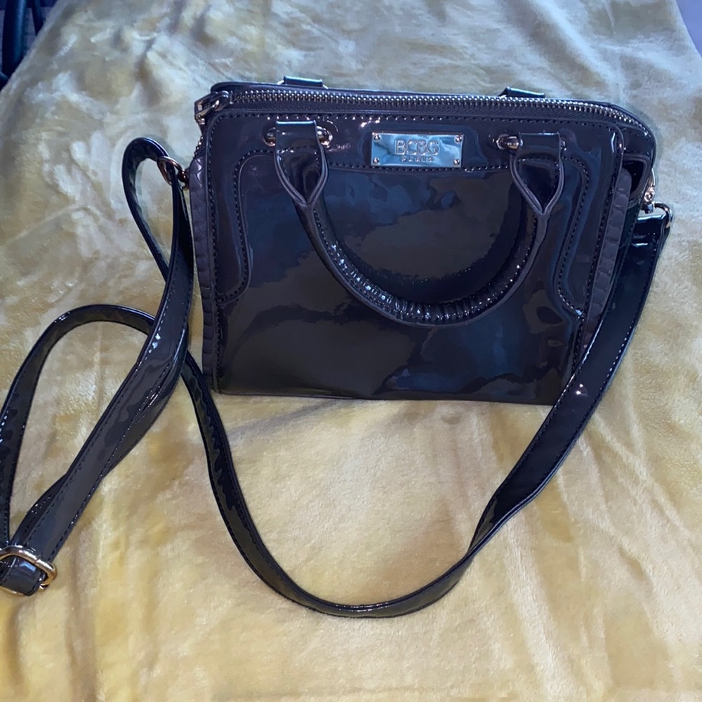 A BCBG Paris bag with a shoulder strap